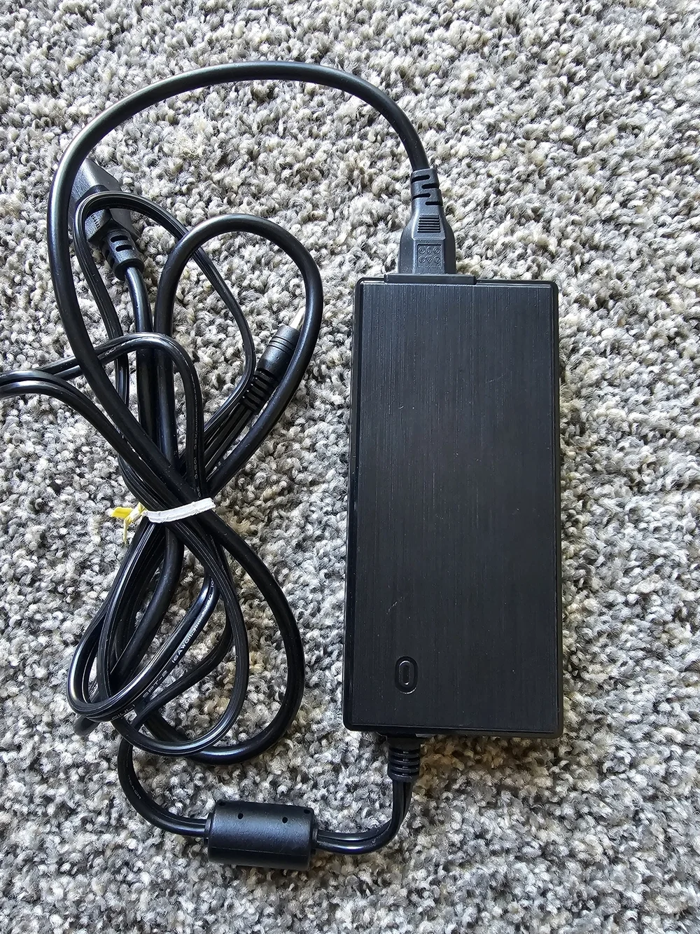 Shenzhen FJ-SW202821007150 switching power adapter.  Input: 100-240V~ 50/60Hz 3